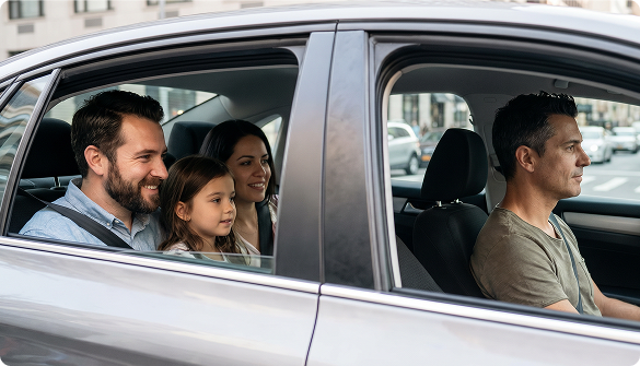 Family riding together in the back seat of a scheduled Prime Time Rideshare