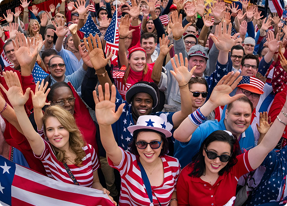 Crowd celebrating the Fourth of July waving American flags