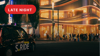 Late night — rideshare on a busy Hollywood street